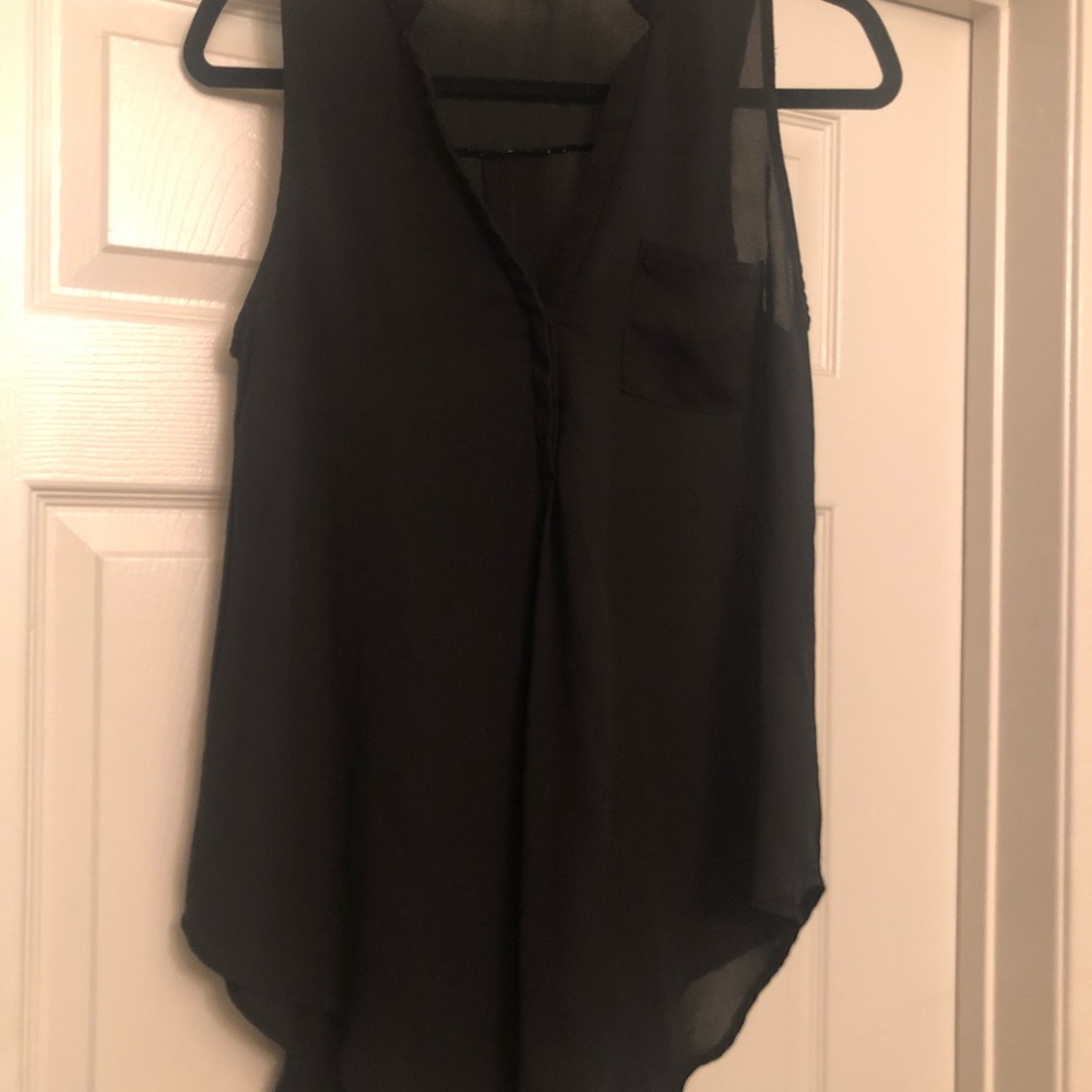 Sleeveless black, high low top.